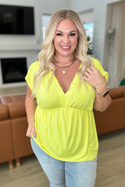Rhea Peplum Top in Neon Yellow-Tops-Authentically Radd Women's Online Boutique in Endwell, New York