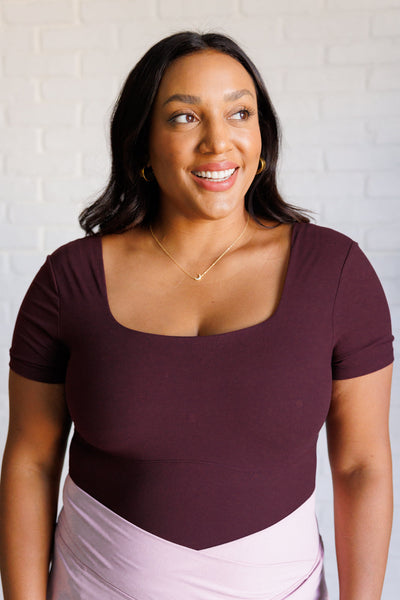 They're Not Like Us Square Neck Bodysuit in Cassis-Tops-Authentically Radd Women's Online Boutique in Endwell, New York